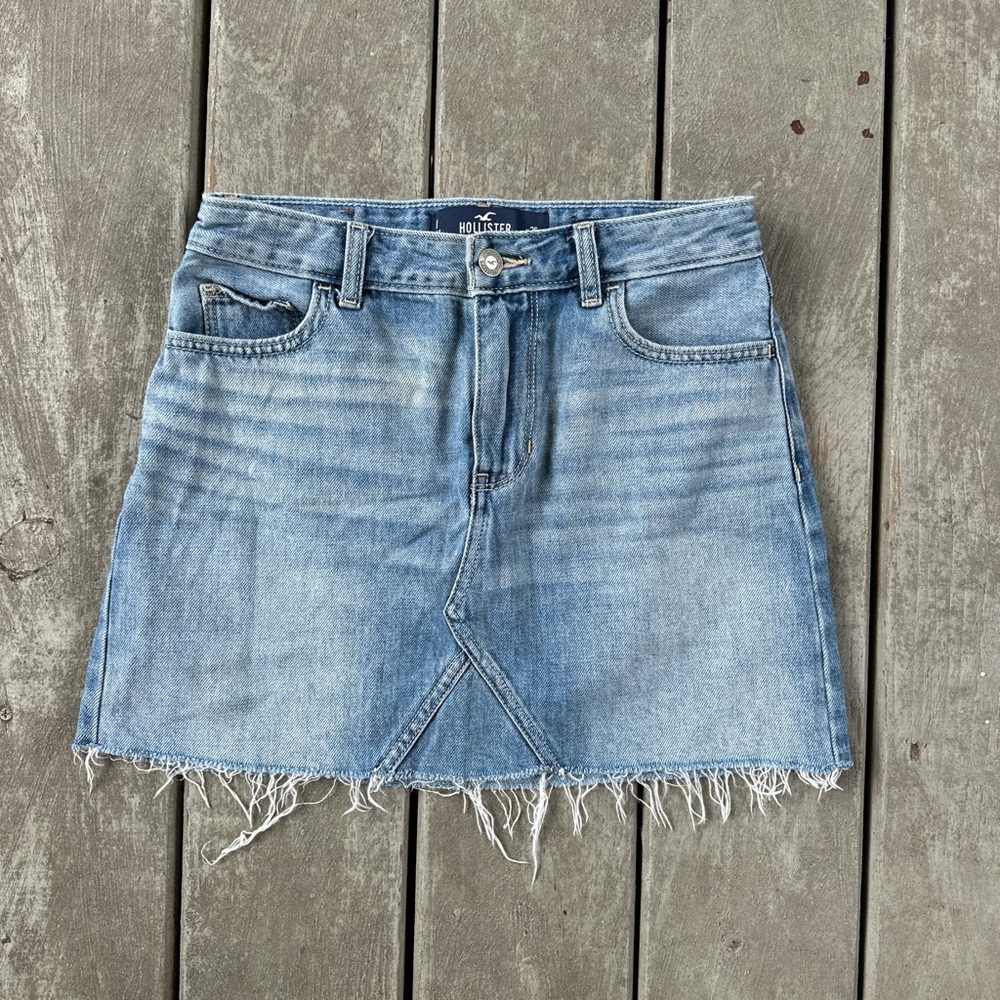 Light wash denim Hollister mini skirt with frayed hem 

Worn a few times